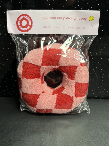 The Happy Piercing cushion